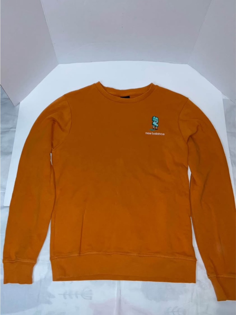 New Balance Men’s Orange Crewneck Pullover with Small Chest Logo